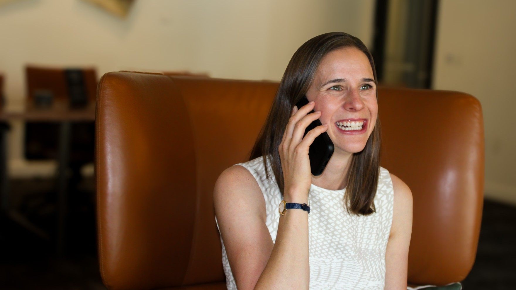 Peggy Fasano on a call with a sponsor